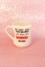 Caneca personalizada com a frase "Eu nasci para fazer tudo aquilo que dizem que MULHER não pode!" em fundo rosa com glitter.