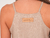 Imagen de TOP ESCOTE HALTER SIMIL GAMUZA
