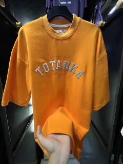 Camiseta Oversized laranja “TOTANKA - USE SLY