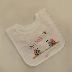 Babero con protección "Vaquitas de san antonio"