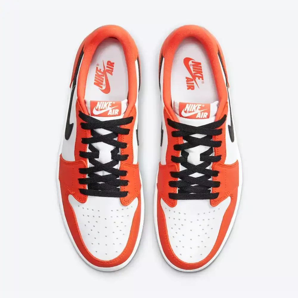 Tênis Nike Air Jordan 1 Low "Starfish" na cor laranja e branca, com detalhes em preto disponível na Supernova Sneakers