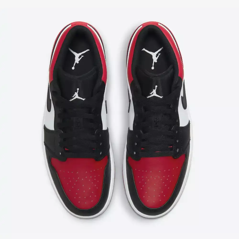 Tênis Air Jordan 1 Low "Bred Toe" com cores preto, vermelho e branco disponível na Supernova Sneakers