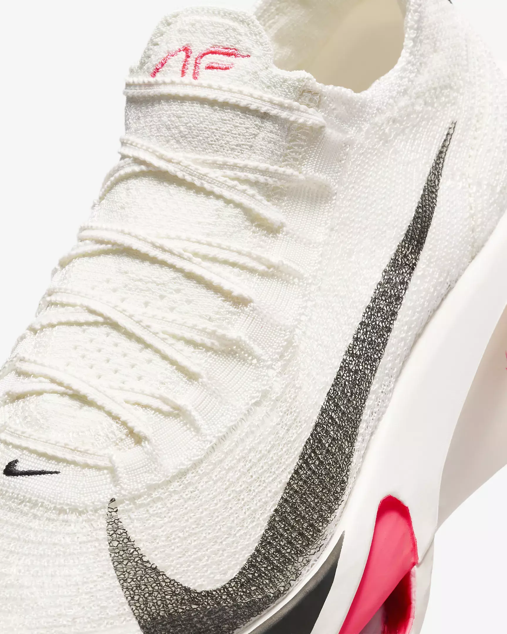 Tênis Nike Air Zoom Alphafly NEXT%3 - Branco, com design aerodinâmico, cabedal em malha e detalhes em preto e vermelho, disponível na Supernova Sneakers.