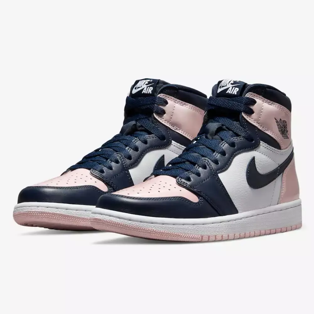 Tênis Air Jordan 1 High "Atmosphere" nas cores rosa e azul marinho, com detalhes em couro e logo da Air Jordan disponível na Supernova Sneakers